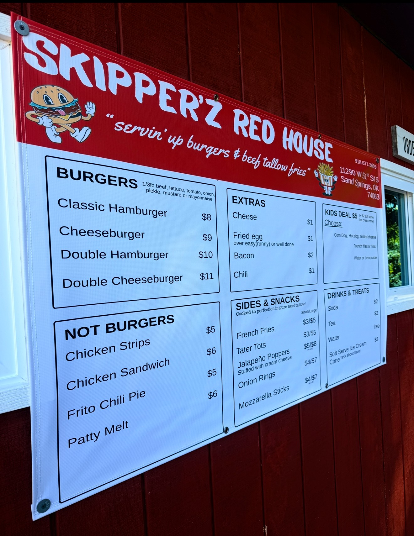 Skipper'z red menu banner on the red building